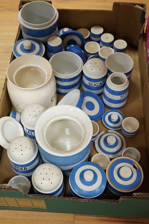 A large collection of Cornishware, cheese dome, butter, sugar, dishes etc